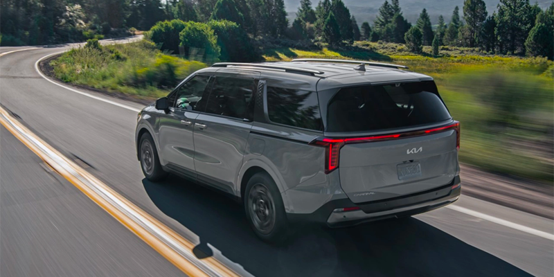 2025 Kia Carnival driving in the country